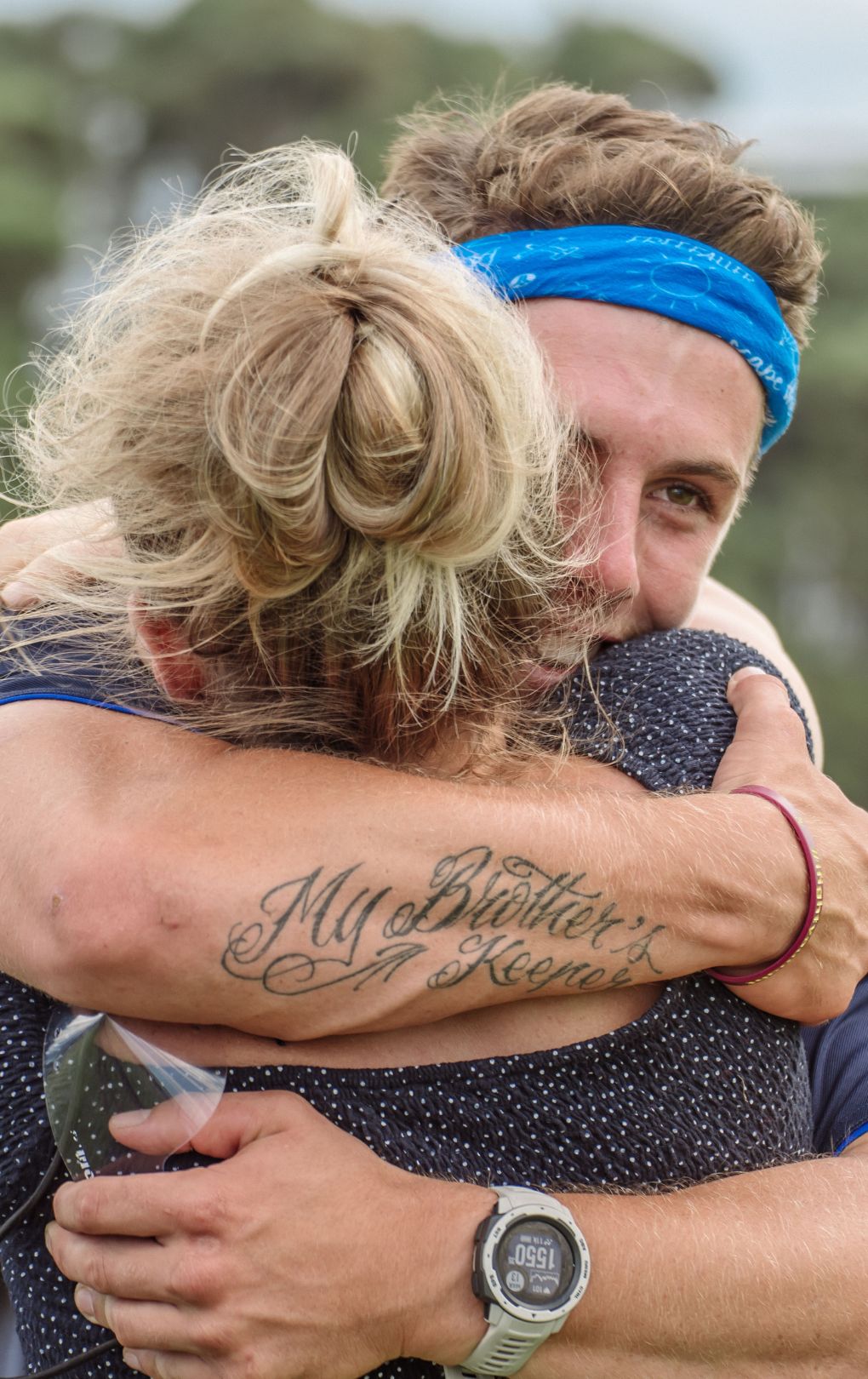 family hug after a skydive